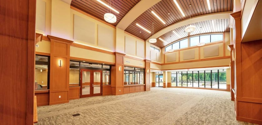Bright, spacious interior common area with large windows