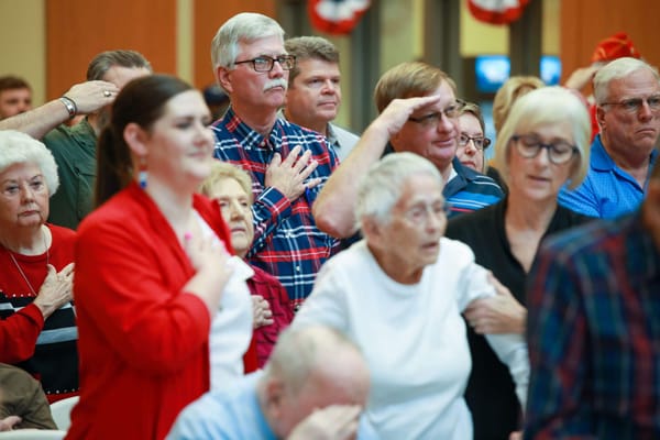 Residents and staff participating in a group activity