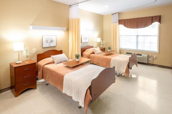 Interior view of a shared resident room with two beds