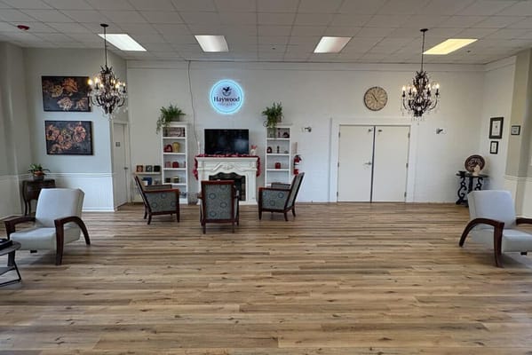 A bright common area with seating and decor