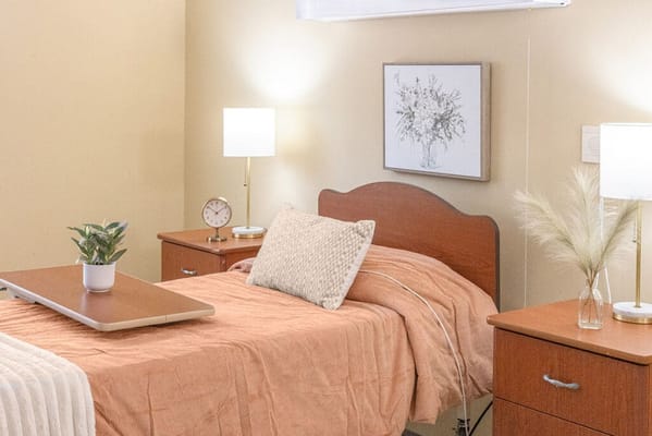 Cozy resident bedroom with warm lighting