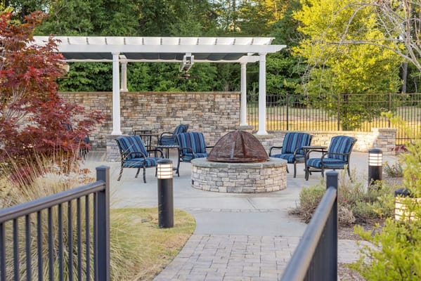 Outdoor seating area with a fire pit and seating