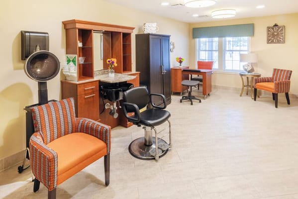 Bright and inviting salon area with styling chairs