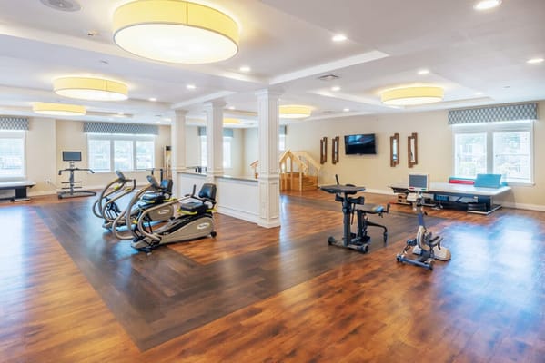 Interior view of a fitness area with exercise equipment