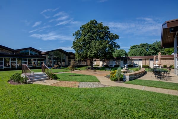 Outdoor area with landscaped garden and seating