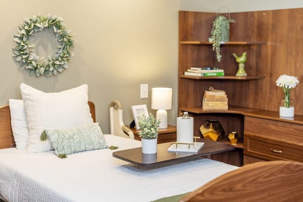 Cozy resident room with warm decor and light