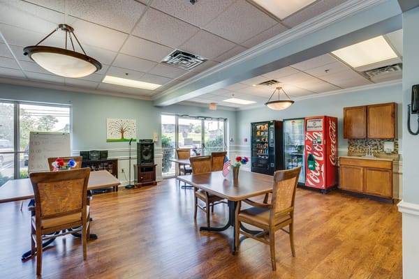 Common area with tables and vending machines