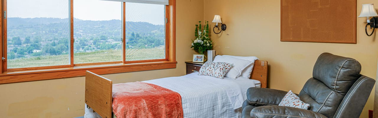 Private resident room with a view and comfortable seating