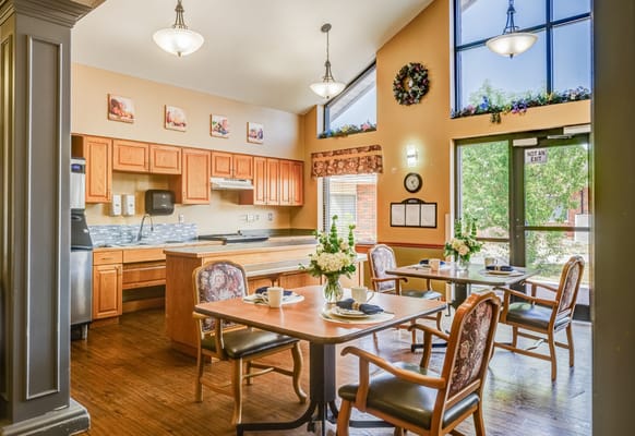Bright dining area with tables set for a meal
