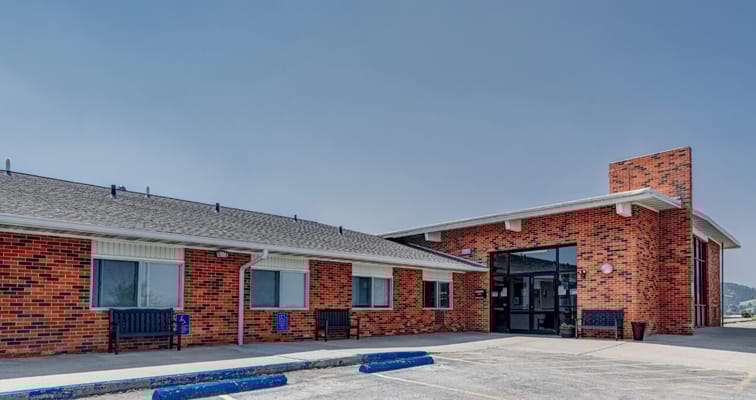 Exterior view of a senior living facility entrance