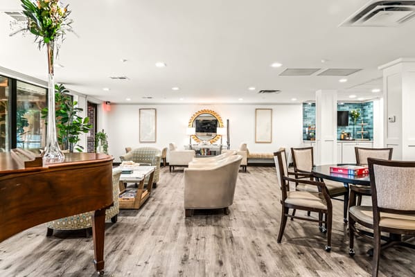 Bright common area with seating and plants