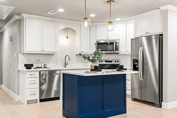 Bright and modern kitchen with stainless steel appliances