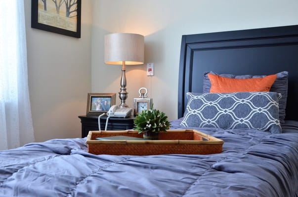 Cozy private resident room with a warm lamp