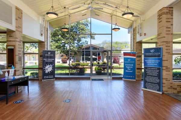 Bright lobby area with large windows and outdoor view