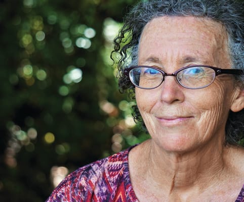 Close-up portrait of a smiling senior woman