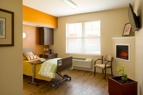 Bright, cozy private resident room with furnishings