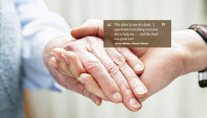 Two hands clasped together, symbolizing care