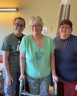 Staff and resident in a shared living space