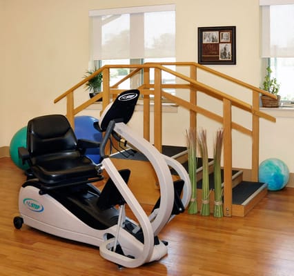 Rehabilitation equipment in a well-lit activity room