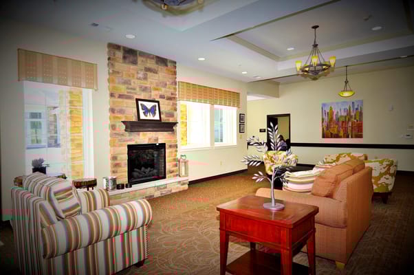 Cozy common area with seating and fireplace