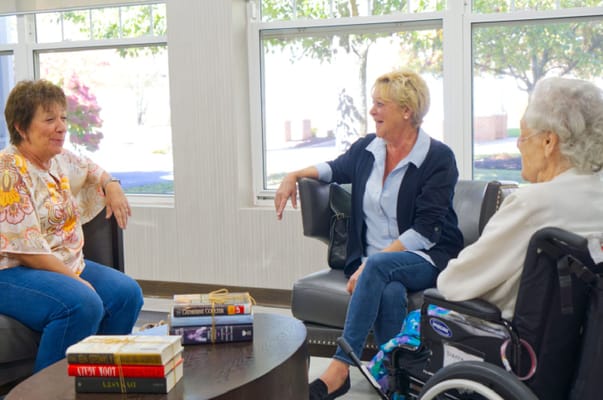 Residents enjoying conversation in a common area