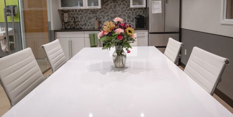 Dining table with a flower vase in a modern kitchen