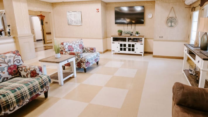 Common area with seating and television