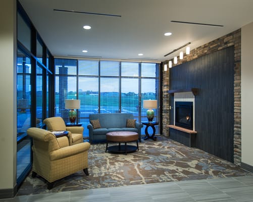 Cozy common area with seating and fireplace