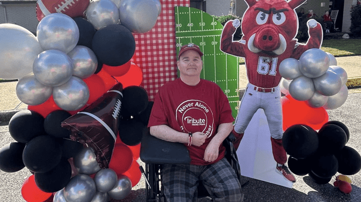 Resident enjoying a festive outdoor event with decorations