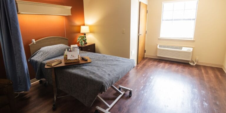 Private resident room with bed and window