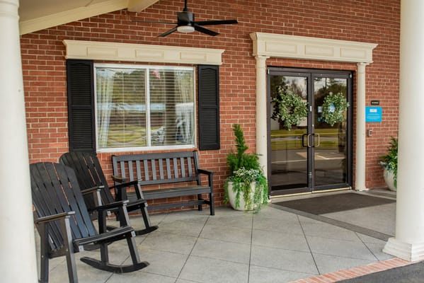 Welcoming outdoor seating area at the entrance