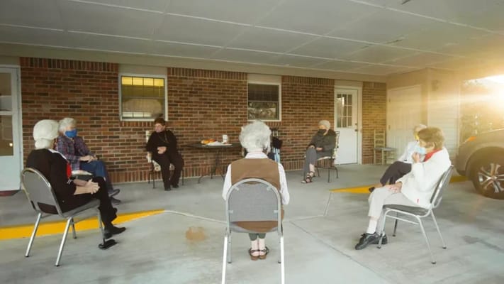 Residents participating in an outdoor group activity