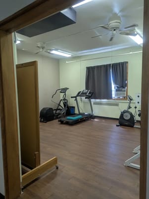 Interior view of a fitness room with equipment
