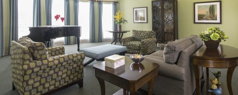 Cozy common area with seating and piano