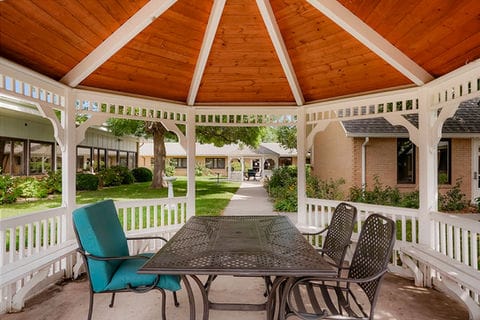 Outdoor gazebo with seating in a senior living facility