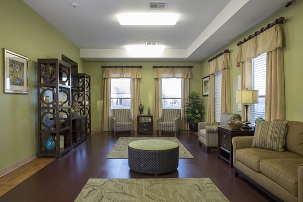 Bright common area with comfortable seating and decor