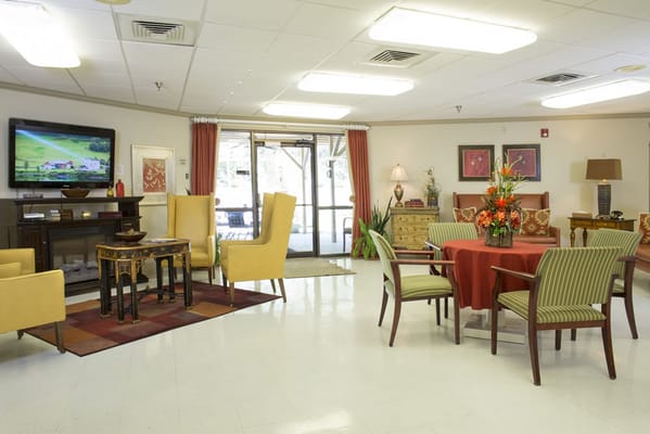 Bright common area with seating and decor
