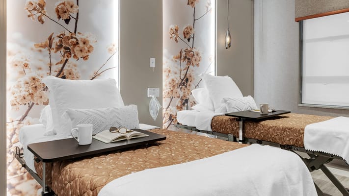 Cozy resident room with floral decor and amenities