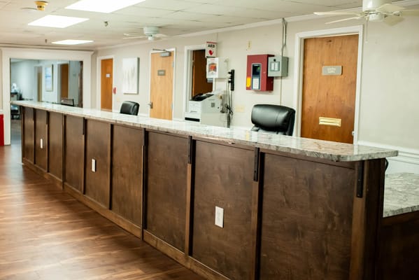 Interior view of a reception area with a counter