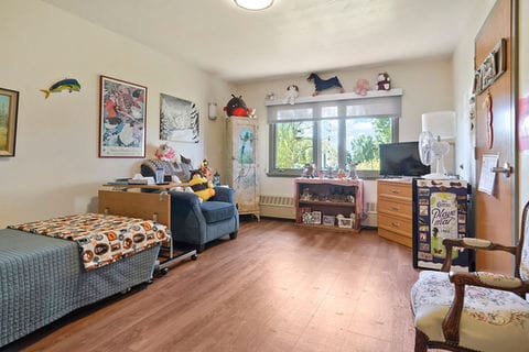 A cozy resident room with personal decorations