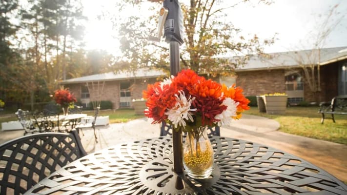 Colorful flowers on a table in an outdoor space