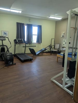 Fitness area with exercise equipment and natural light