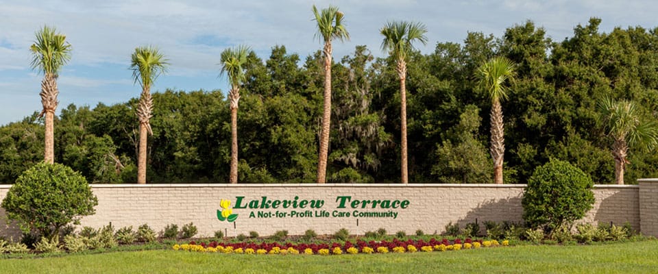 Signage for Lakeview Terrace with landscaped surroundings