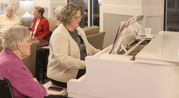 Residents enjoying music in a common area