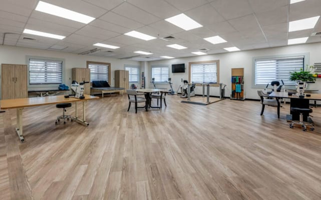 Interior view of a spacious activity room with equipment