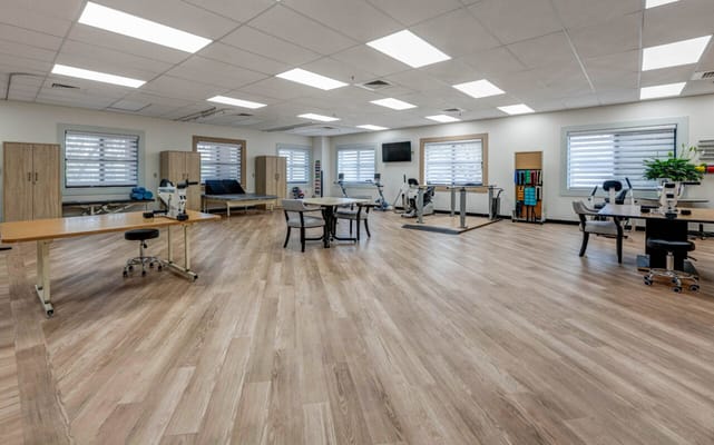 Interior view of a spacious activity room with equipment