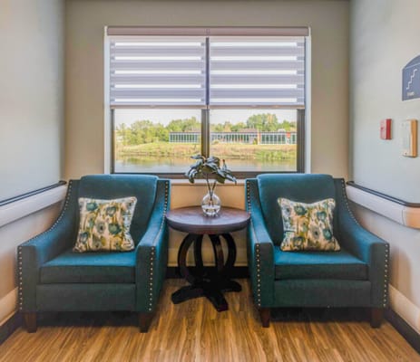 Comfortable seating area by a large window