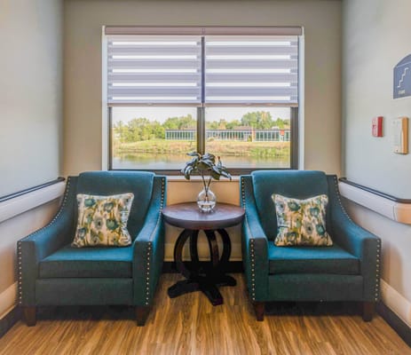 Comfortable seating area by a large window