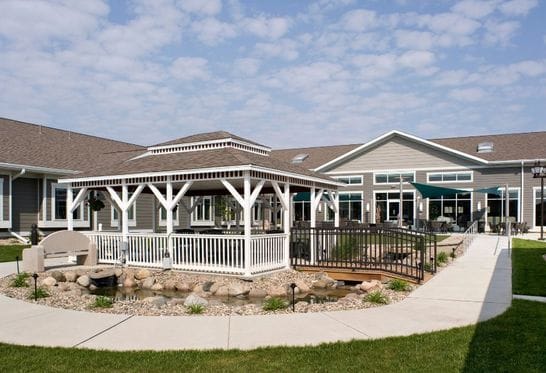 Outdoor gazebo and garden area of a senior living facility
