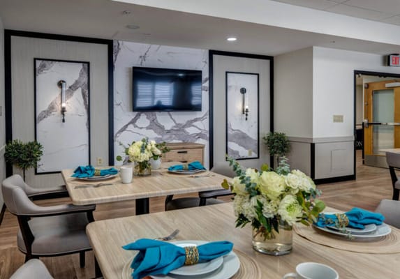 Dining area with elegant table settings and decor